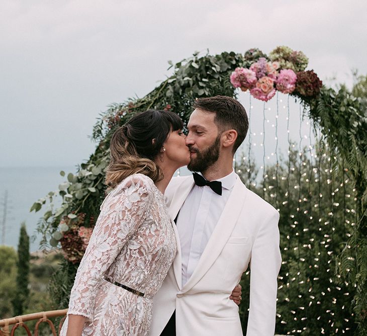 Wedding Ceremony | Bride in Embellished Ze García Bridal Gown with Front Split | Groom in Tailor Made Tom Black Suit | Stylish Outdoor Wedding at Masia Casa del Mar in Barcelona, Spain | Sara Lobla Photography | Made in Video Film