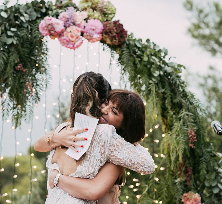 Wedding Ceremony | Bride in Embellished Ze García Bridal Gown with Front Split | Stylish Outdoor Wedding at Masia Casa del Mar in Barcelona, Spain | Sara Lobla Photography | Made in Video Film