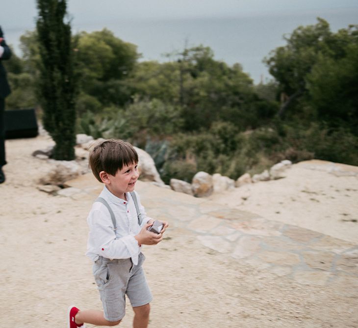 Wedding Ceremony | Page Boy | Ring Bearer | Stylish Outdoor Wedding at Masia Casa del Mar in Barcelona, Spain | Sara Lobla Photography | Made in Video Film