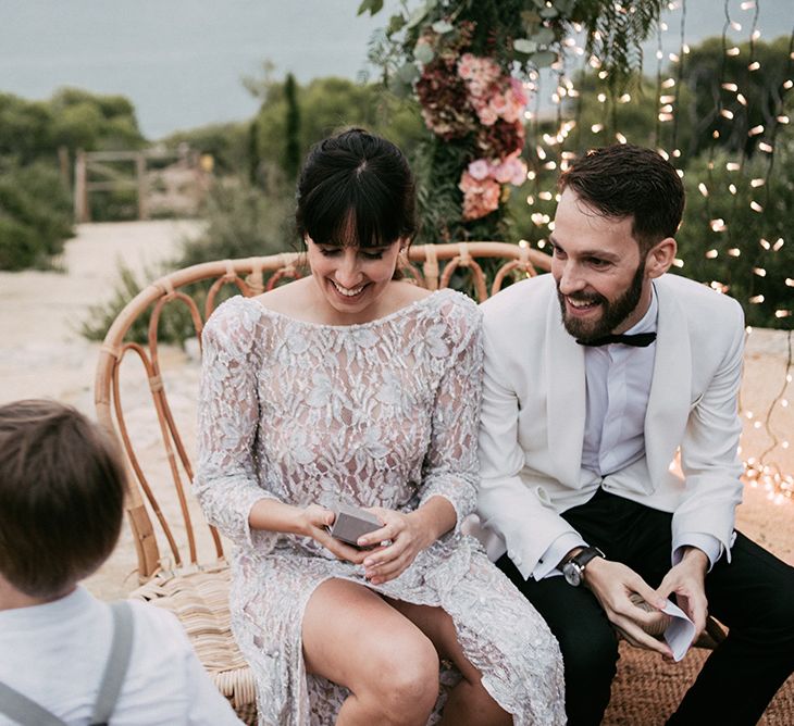 Wedding Ceremony | Bride in Embellished Ze García Bridal Gown with Front Split | Groom in Tailor Made Tom Black Suit | Stylish Outdoor Wedding at Masia Casa del Mar in Barcelona, Spain | Sara Lobla Photography | Made in Video Film