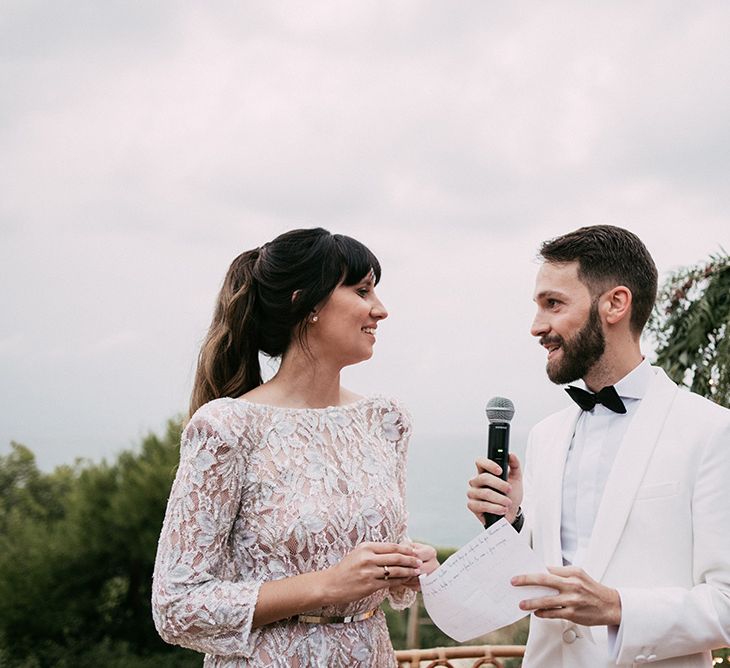 Wedding Ceremony | Bride in Embellished Ze García Bridal Gown with Front Split | Groom in Tailor Made Tom Black Suit | Stylish Outdoor Wedding at Masia Casa del Mar in Barcelona, Spain | Sara Lobla Photography | Made in Video Film