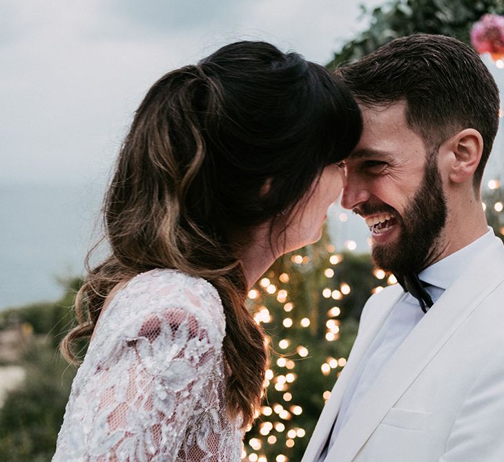 Wedding Ceremony | Bride in Embellished Ze García Bridal Gown with Front Split | Groom in Tailor Made Tom Black Suit | Stylish Outdoor Wedding at Masia Casa del Mar in Barcelona, Spain | Sara Lobla Photography | Made in Video Film