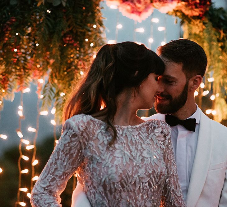 Bride in Embellished Ze García Bridal Gown with Front Split | Groom in Tailor Made Tom Black Suit | Stylish Outdoor Wedding at Masia Casa del Mar in Barcelona, Spain | Sara Lobla Photography | Made in Video Film