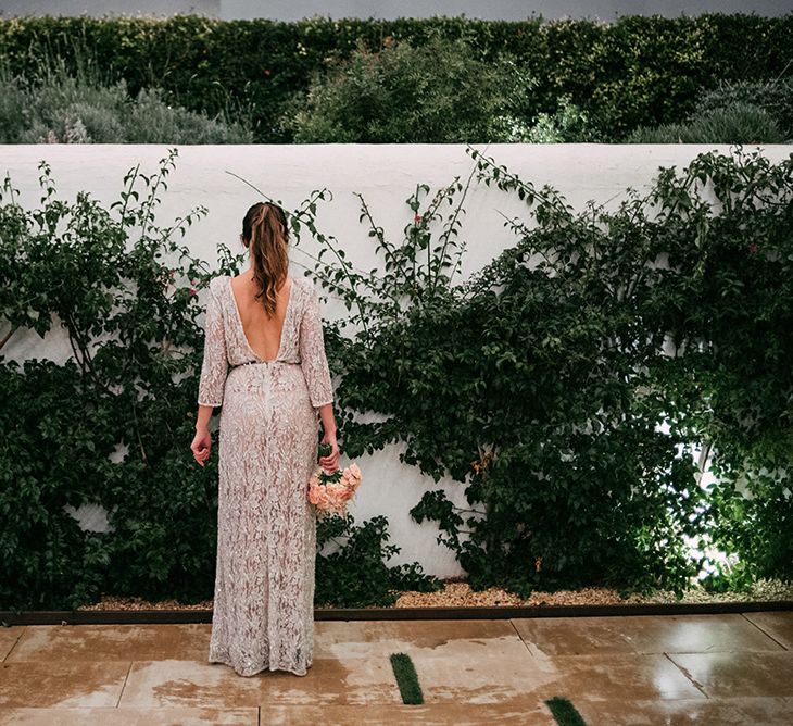 Bride in Embellished Ze García Bridal Gown with Front Split | Stylish Outdoor Wedding at Masia Casa del Mar in Barcelona, Spain | Sara Lobla Photography | Made in Video Film