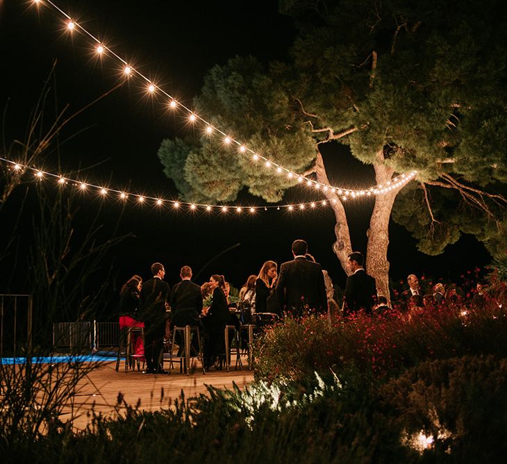 Festoon Lights | Stylish Outdoor Wedding at Masia Casa del Mar in Barcelona, Spain | Sara Lobla Photography | Made in Video Film