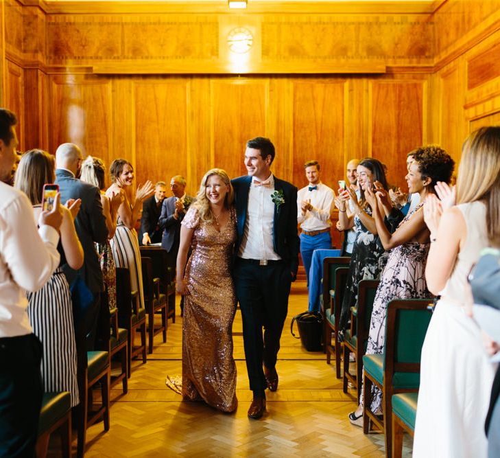 Bride & Groom Walking up the Aisle