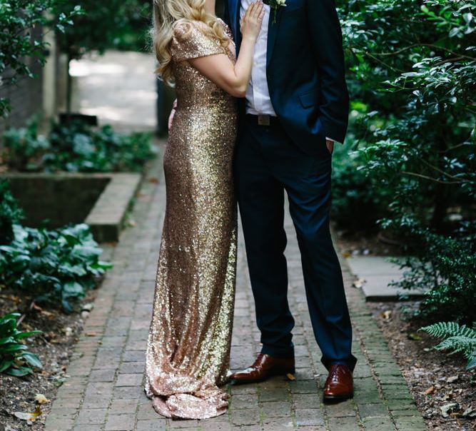 Bride in Gold Sequin Gibson Bespoke Wedding Dress & Groom in Marks and Spencer Suit