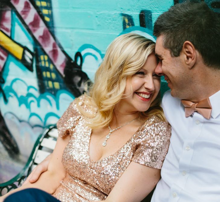 Bride in Gold Sequin Gibson Bespoke Wedding Dress & Groom in Marks and Spencer Suit