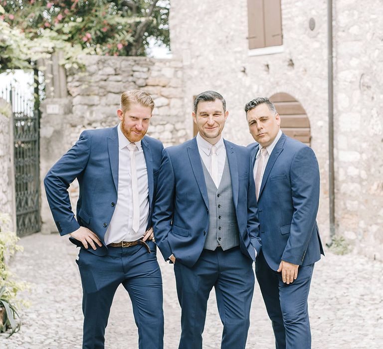 Groomsmen in Navy Next Suits | Elegant Family Destination Wedding at Malcesine in Italy, Planned by Lake Garda Weddings | Georgina Harrison Photography