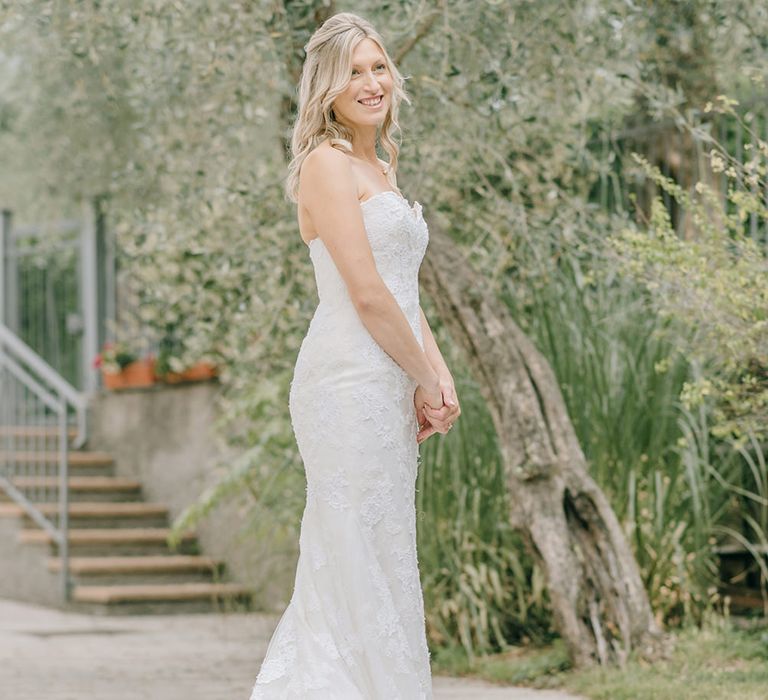 Bride in Lace Enzoani Wedding Dress | Elegant Family Destination Wedding at Malcesine in Italy, Planned by Lake Garda Weddings | Georgina Harrison Photography