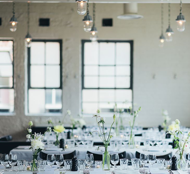 White Flower Stems in Vases