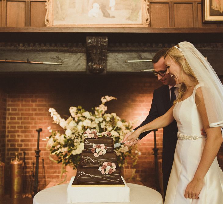 Bride & Groom Cutting the Cake