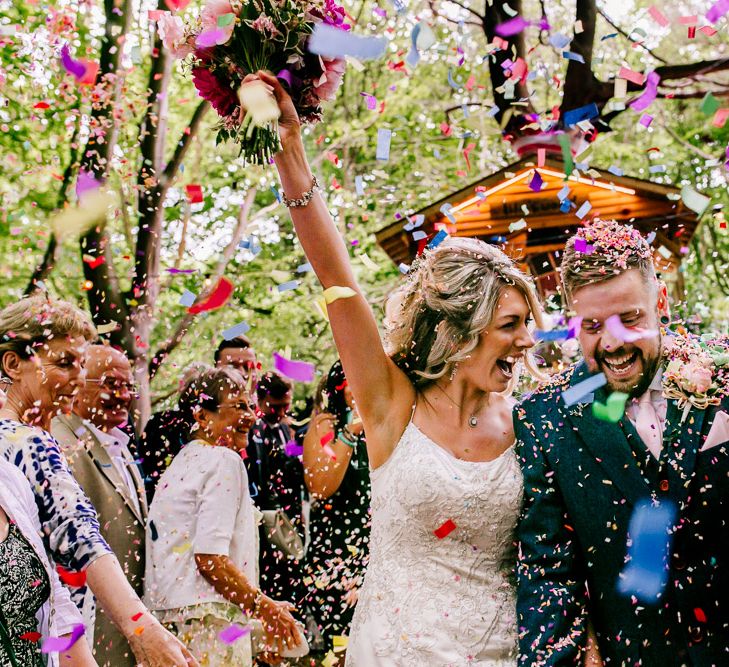 Confetti Moment | Bride in Lace Anna Sorrano Gown | Groom in Tweed Vintage Suit Hire Suit | Epic Love Story Photography