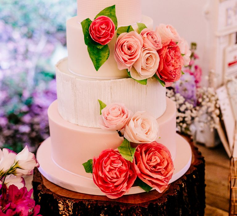 Wedding Cake on Tree Stump Cake Stand | Brightly Coloured Woodland Wedding | Epic Love Story Photography