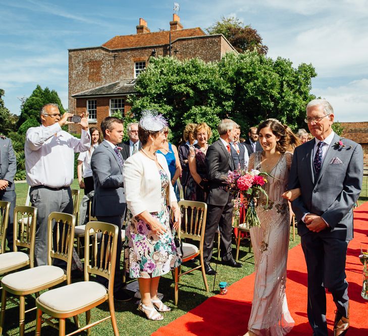 Outdoor Ceremony with Bridal Entrance in Pre Owned Jenny Packham Wedding Dress