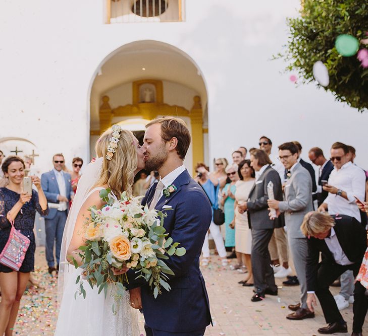 Confetti Exit | Bride in Flora Bridal Wedding Dress | Raquel Benito Photography