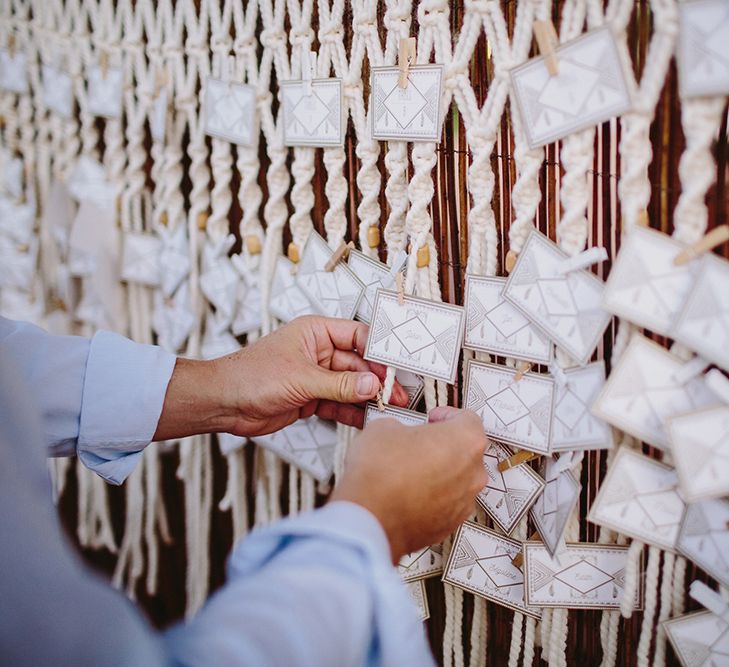 Macrame Escort Card Display | Outdoor Las Cicadas Ibiza Destination Wedding | Raquel Benito Photography