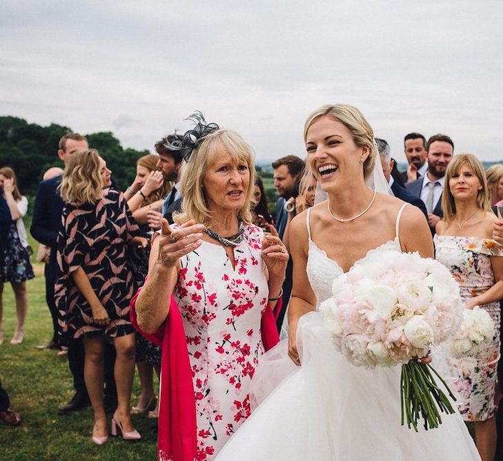 Bride in Mori Lee Wedding Dress with Peony Bouquet