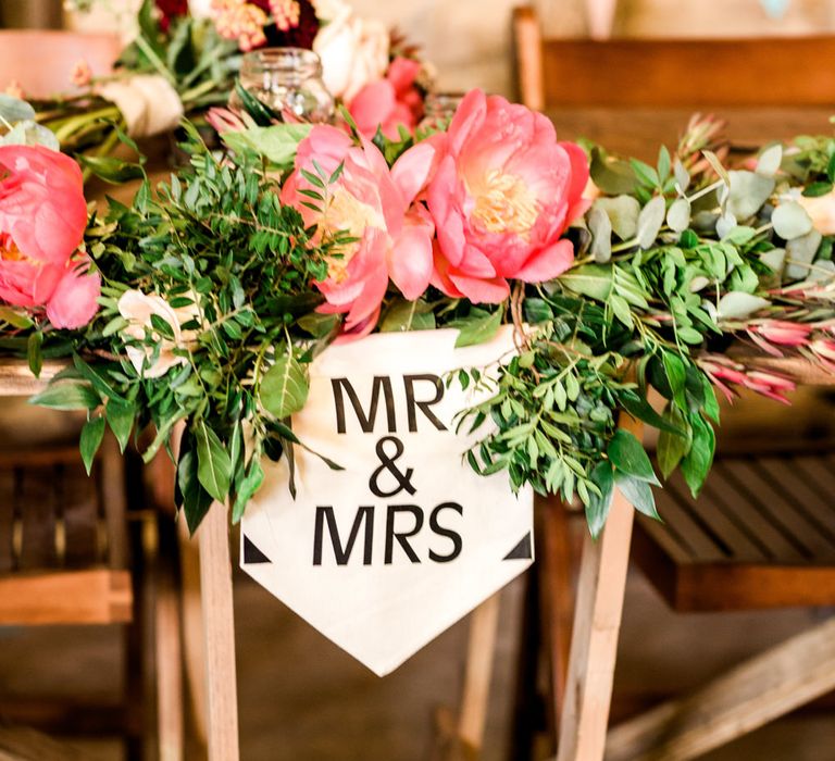 Floral Garland Wedding Decor | Thames Chase Centre Boho Wedding | Gyan Gurung Photography