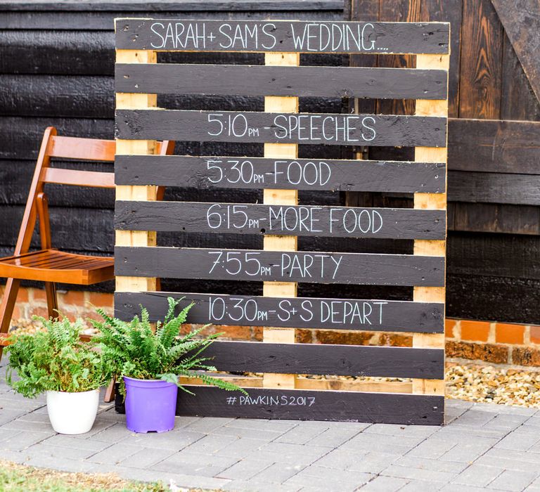 Wooden Palette Order of The Day Wedding Sign | Thames Chase Centre Boho Wedding | Gyan Gurung Photography