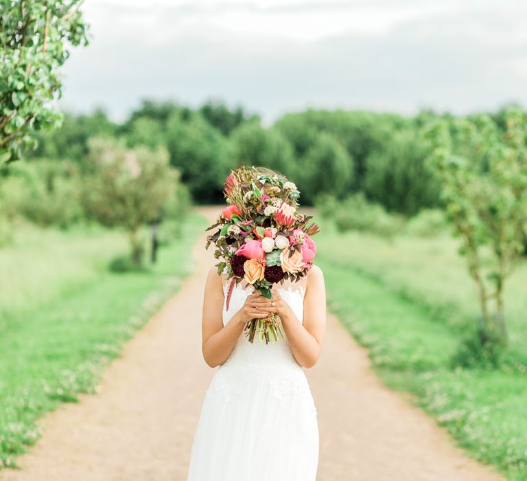 Pink Bridal Bouquet | Bride in Pure Bride Dresses | Thames Chase Centre Boho Wedding | Gyan Gurung Photography