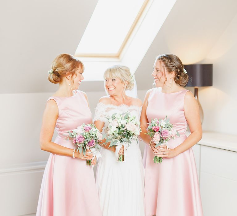 Bridesmaids in Pink Alfred Sung Dresses