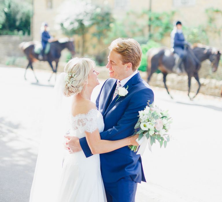 Bride in Naomi Neoh Loretta Gown with Stewart Parvin Lace Jacket & Suzanne Neville Belt