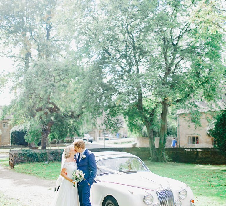 Bride in Naomi Neoh Loretta Gown with Stewart Parvin Lace Jacket & Suzanne Neville Belt