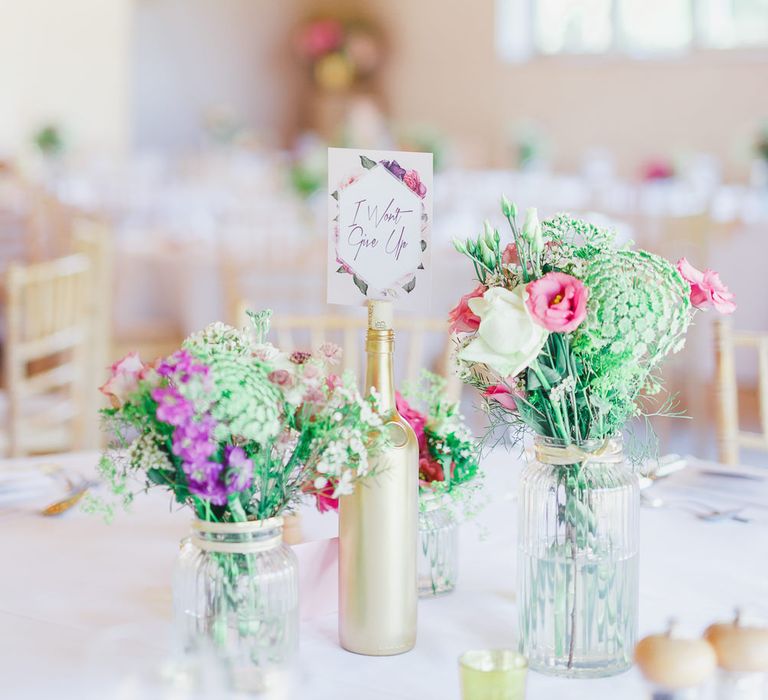 Gold Spray Painted Bottles & Flower Stem Centrepieces