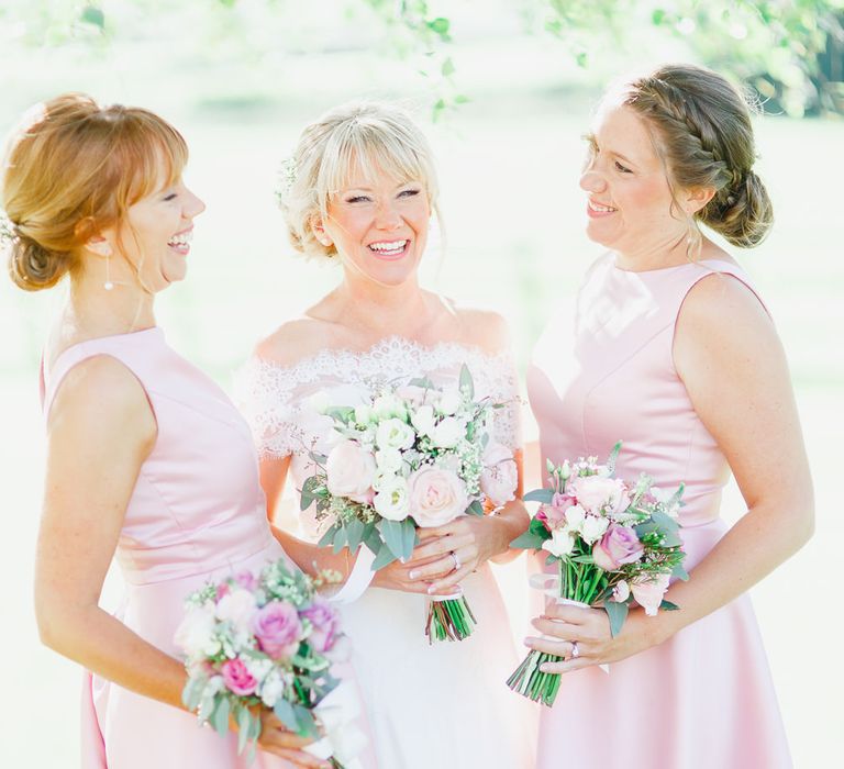 Bridesmaids in Pink Alfred Sung Dresses