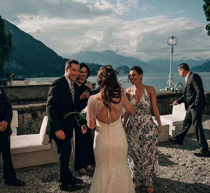 Bride in Lace Fishtail Gown & Beaded Stole | Bellagio Lake Como Wedding Venue | Jason Mark Harris Photography | Harris Films