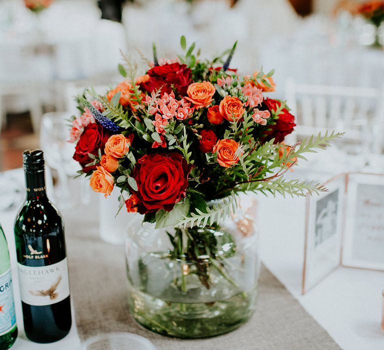 Red Rose Centrepiece | Luxe Wedding at St Stephen's Trust, Deconsecrated Church in Hampstead, London | Irene yap Photography