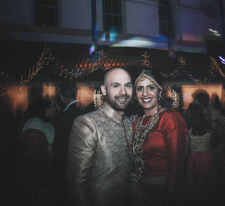 Non Religious Wedding With Indian & Spanish Cultural Traditions Bride In Simple Red Wedding Sari & ASOS Dress Images By Meghan Lorna