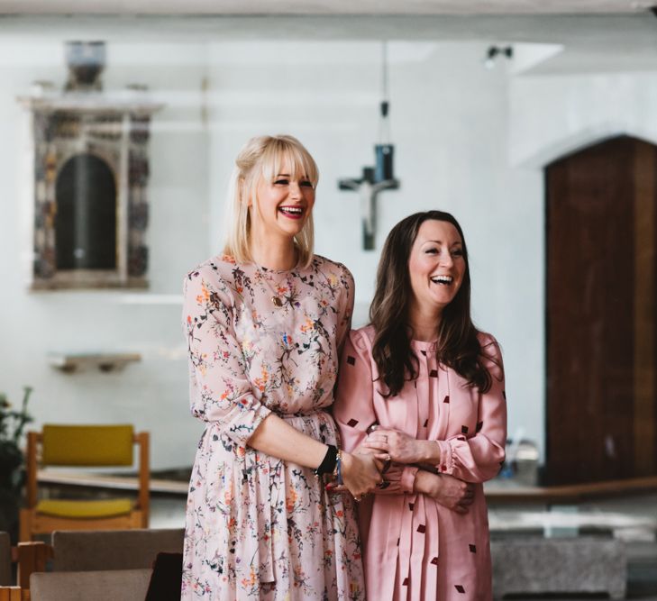 Wedding Guests In Pink Floral Dresses