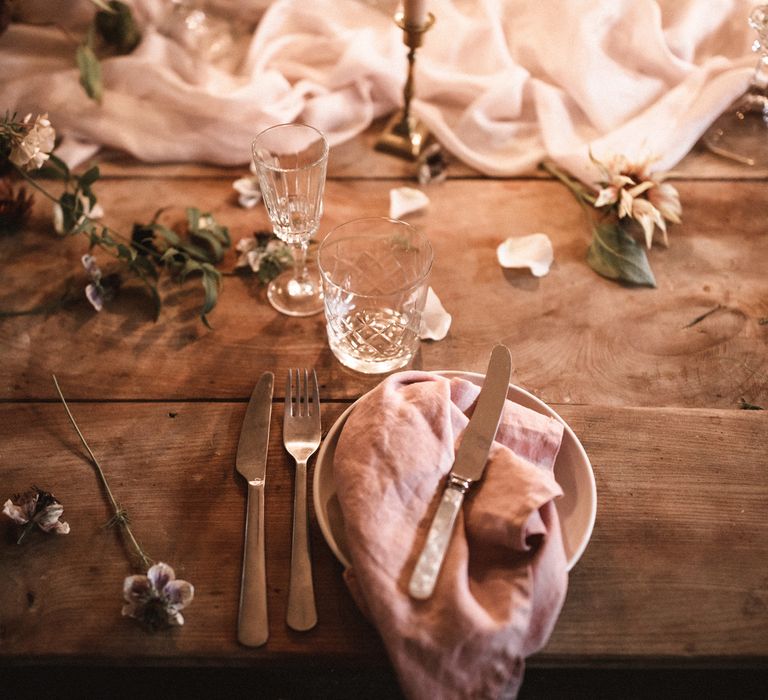 Short Cream Candles by Nordic House // Tall White Candles by Charles Farris // Vintage Glass & Copper Candlestick Holders to hire by Beatnik Bride // Silk Table Runner by Pompom Blossom // Linen Napkins & Plates by H&M Home // All vintage glassware and cutlery to hire by Beatnik Bride