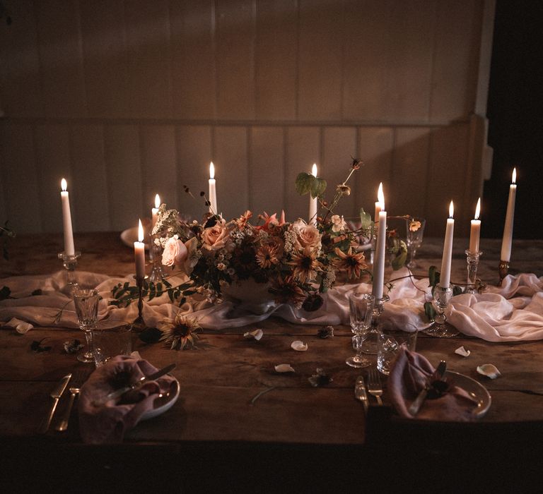 Short Cream Candles by Nordic House // Tall White Candles by Charles Farris // Vintage Glass & Copper Candlestick Holders to hire by Beatnik Bride // Silk Table Runner by Pompom Blossom // Linen Napkins & Plates by H&M Home // All vintage glassware and cutlery to hire by Beatnik Bride