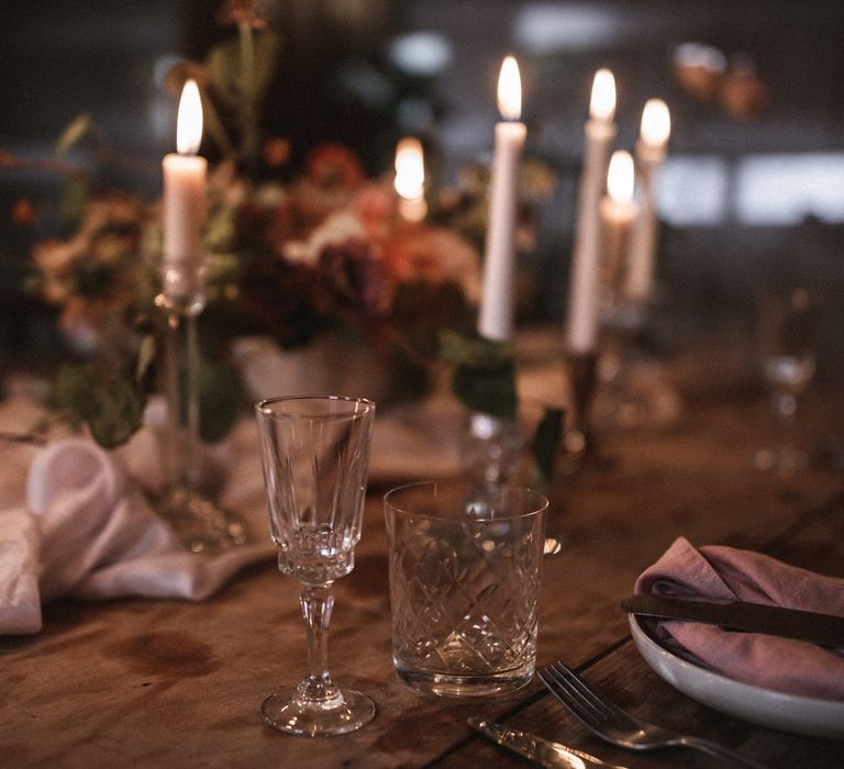 Short Cream Candles by Nordic House // Tall White Candles by Charles Farris // Vintage Glass & Copper Candlestick Holders to hire by Beatnik Bride // Silk Table Runner by Pompom Blossom // Linen Napkins & Plates by H&M Home // All vintage glassware and cutlery to hire by Beatnik Bride