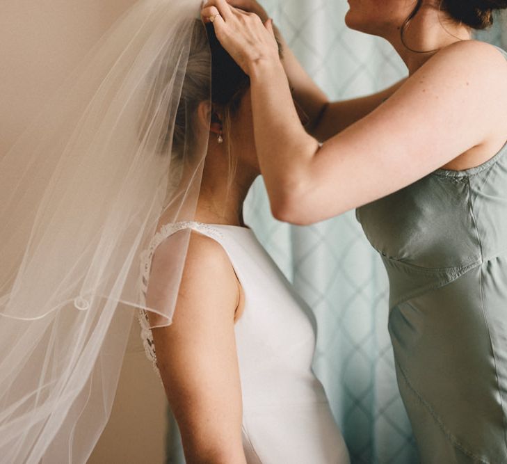 Bride in Pronovias Gown | Bridesmaid in Pale Green Ghost Dress | The Harbour Church Portsmouth Wedding | Emily & Steve Photography