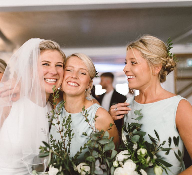 Bride in Pronovias Gown | Bridesmaid in Pale Green Ghost Dress | The Harbour Church Portsmouth Wedding | Emily & Steve Photography