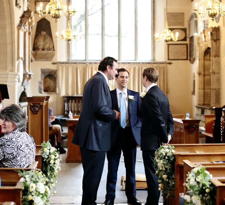 Groomsmen in Gieves and Hawkes Suit at the Altar | Dasha Caffrey Photography