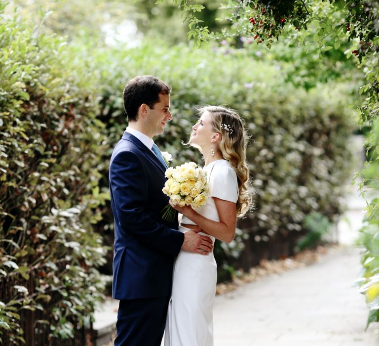 Bride in Contemporary J Mendel Wedding Dress | Groom in Gieves & Hawkes Suit | Dasha Caffrey Photography