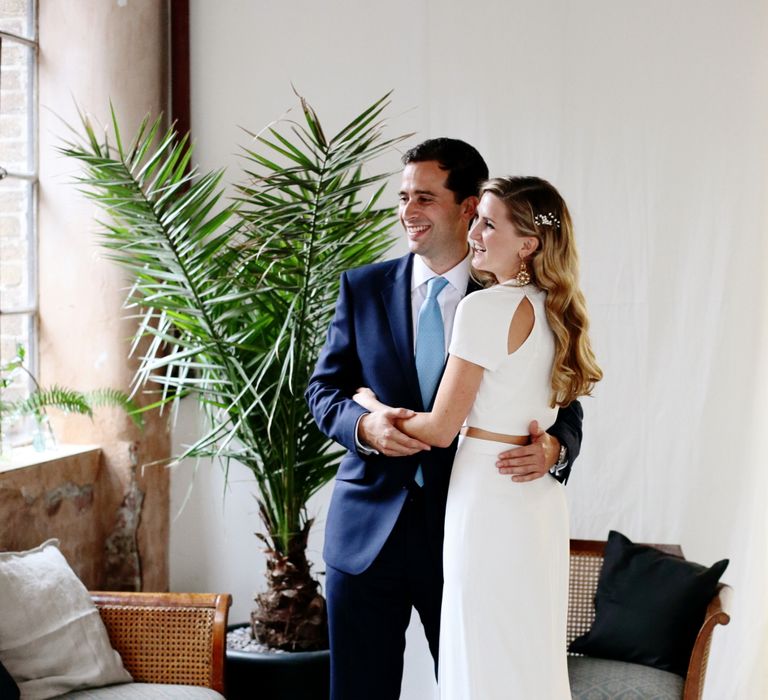 Bride in Contemporary J Mendel Wedding Dress | Groom in Gieves & Hawkes Suit | Dasha Caffrey Photography