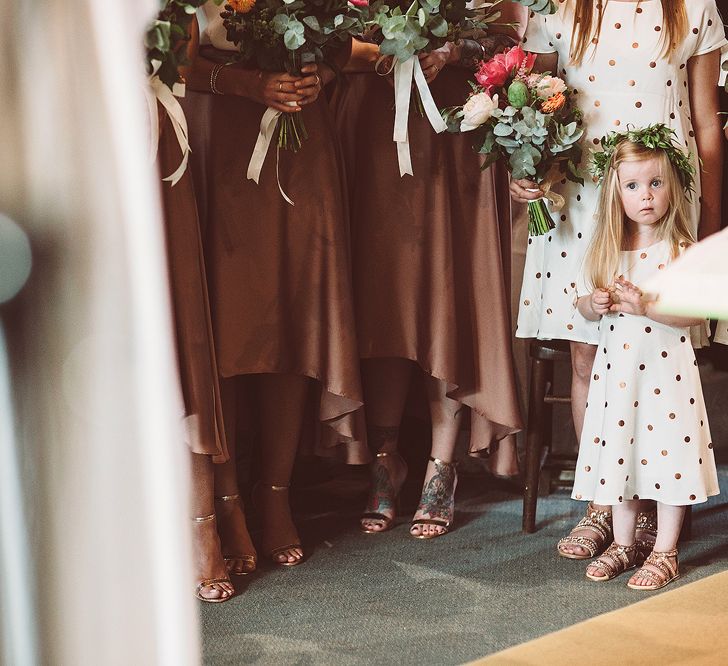 Bridesmaids In Copper Skirts With Cream Tops