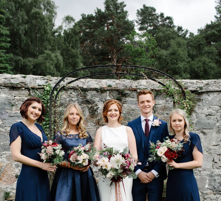 Bridesmaids In Navy Biba Dresses // Outdoor Wedding In Scotland With Burgundy, Pink & Navy Colour Scheme Images From Caro Weiss Photography & Bespoke Stationery From de Winton Paper Co