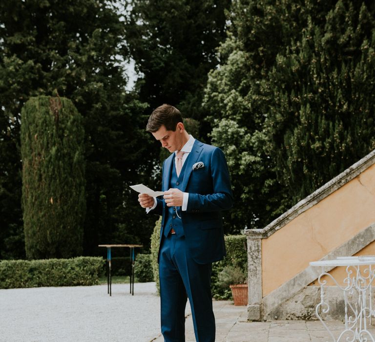 Groom In Navy Bespoke Suit