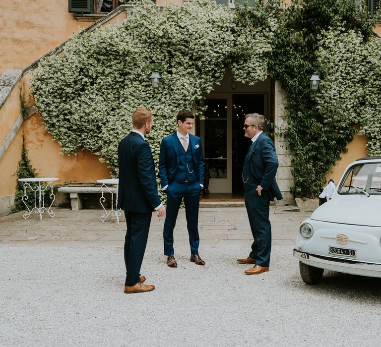 Groom In Navy Bespoke Suit