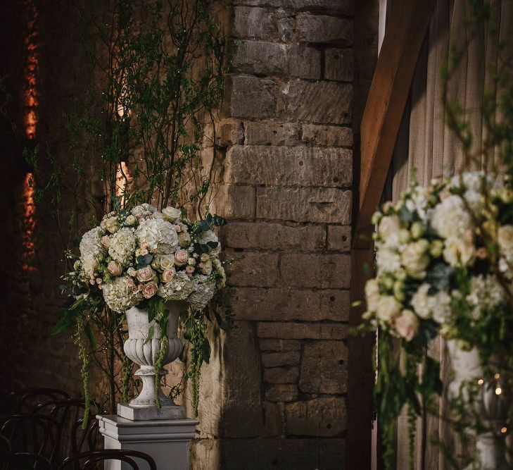 Cripps Barn Ceremony Room | Floral Arrangements | Andy Gaines Photography | Thompson Granger Films