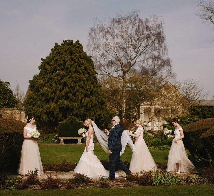 Bride in Christos Costarellos Fishtail Gown | Bridesmaids in Blush Tulle Skirt & White Top Separates | Andy Gaines Photography | Thompson Granger Films