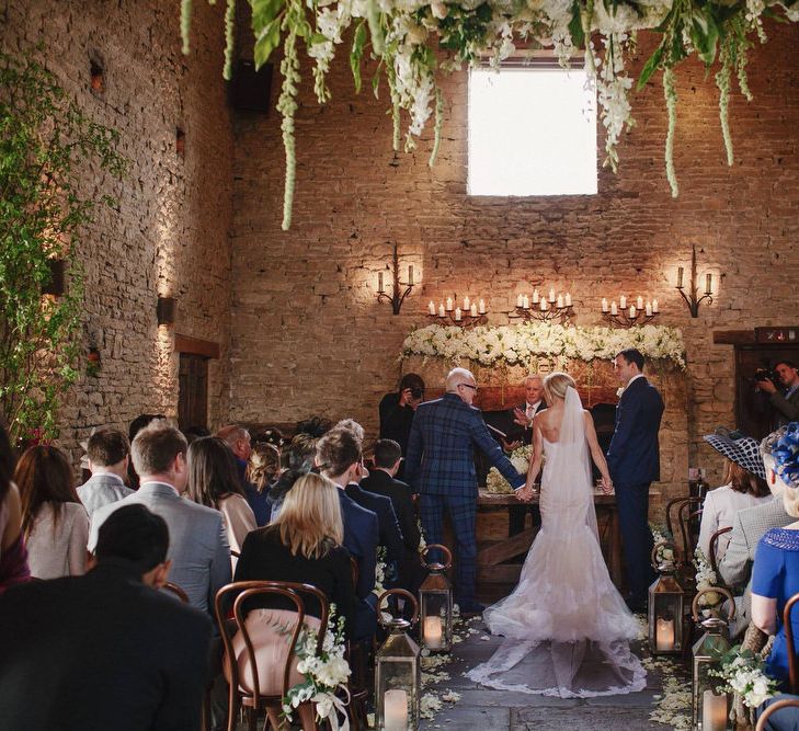 Cripps Barn Wedding Ceremony | Bride in Christos Costarellos Fishtail Gown | Andy Gaines Photography | Thompson Granger Films