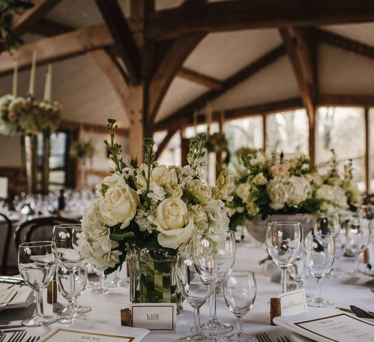 White Floral Centrepieces | Cripps Barn Wedding | Andy Gaines Photography | Thompson Granger Films